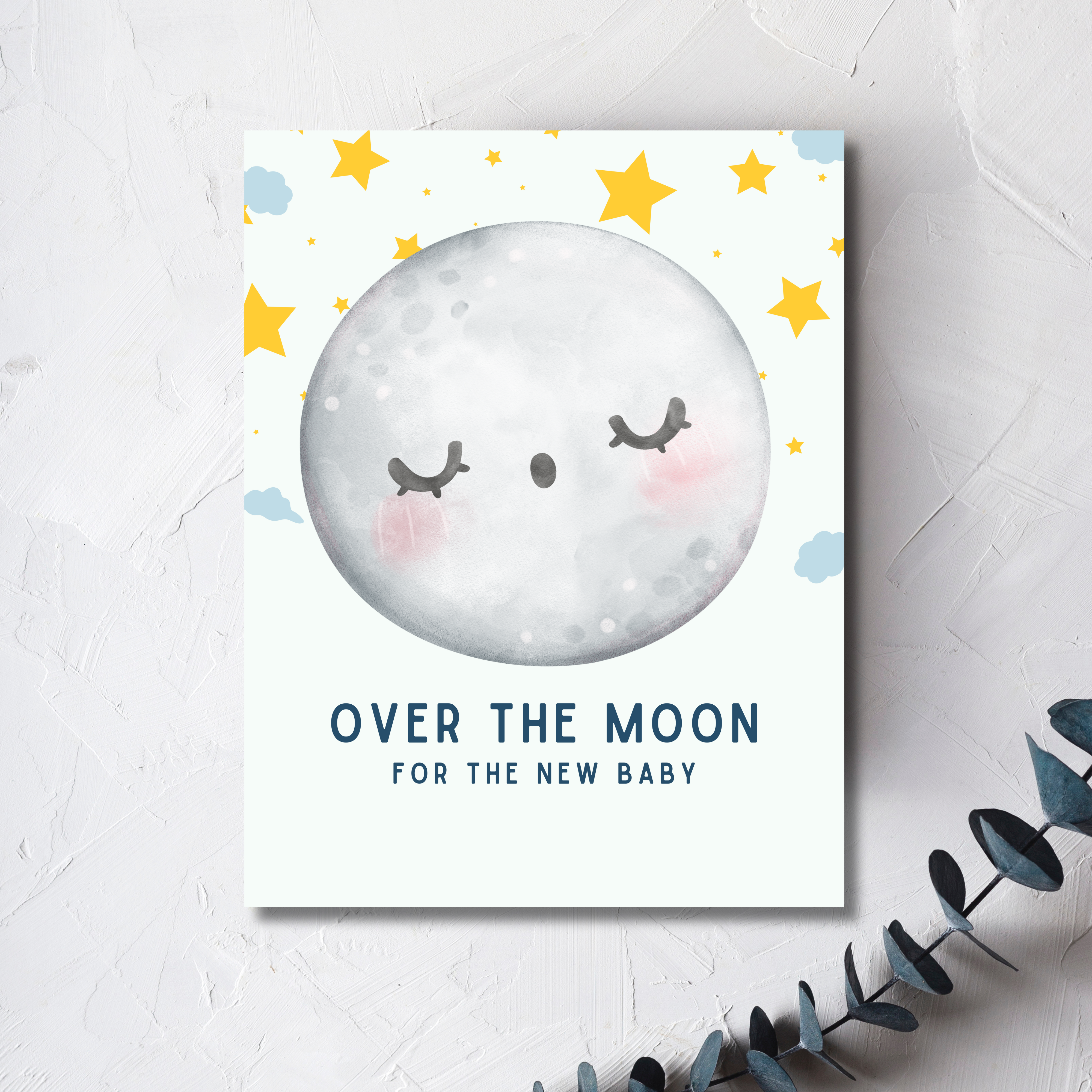 Image of an illustrated watercolor full moon blushing with stars in the sky, text reads Over The Moon For The New Baby below in blue